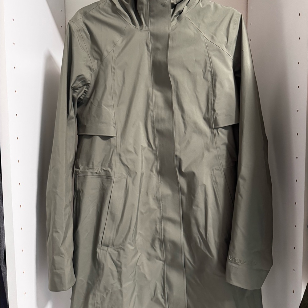 lululemon athletica Hooded Raincoat in Olive